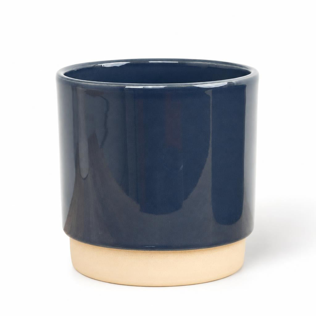 Eno Blue pot with a dark space blue centre and banana yellow lower quarter